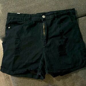 Black distressed stretchy jean shorts